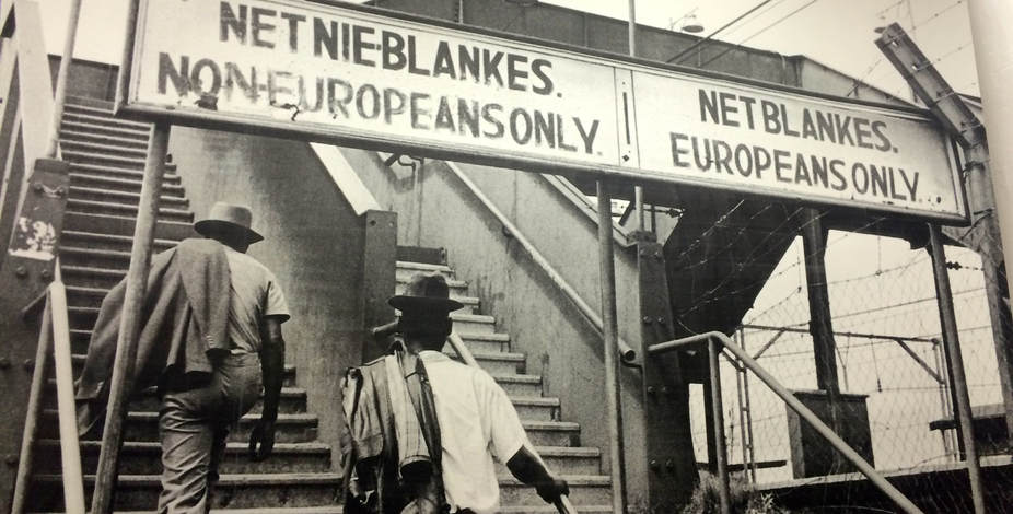 This is an image of the separation of Africans and Europeans who colonozied Africa , the apartheid laws instilled a strong mindset of hate towards black people and has still managed to stick around 21st century South Africa
