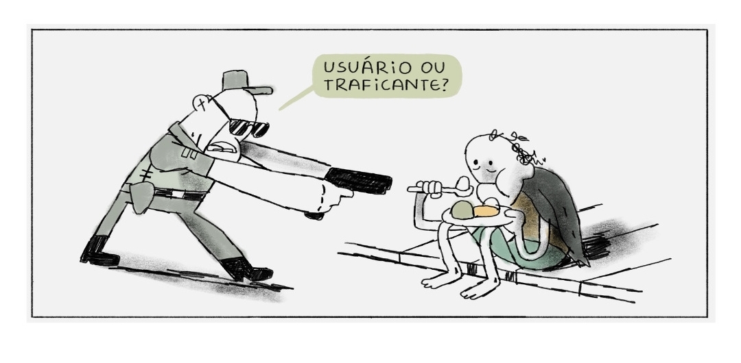 Cop pointing a gun to a person eating in the street